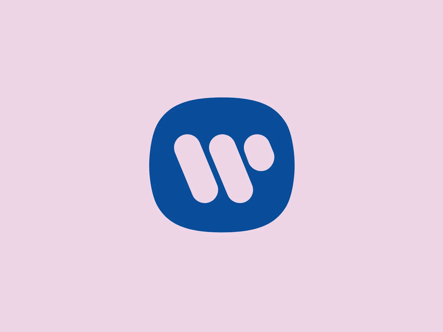 The Warner Music logo features a stylized letter 'M' composed of three rounded shapes arranged at a diagonal within a slightly rounded rectangular background. The 'M' consists of three white pill-like shapes that are closely nested to suggest fluidity and motion. The background is a solid, bold shade of blue that provides high contrast against the white elements, giving the logo a modern and dynamic feel. The rounded corners of the rectangle and the overlapping elements of the 'M' create a sense of softness and approachability.