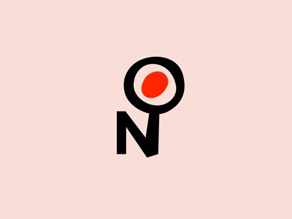 The Novabase logo features a bold and striking design with a capital letter "N" in a thick, black sans-serif font. A perfect circle with a thick black outline is attached to the upper right side of the "N", housing a smaller, solid red circle at its center. The modern and minimalistic aesthetic, along with the contrast of red against black, creates a visually impactful design. The simplicity of shapes - the straight lines of the "N" and the geometric circle - results in a clean and memorable image.