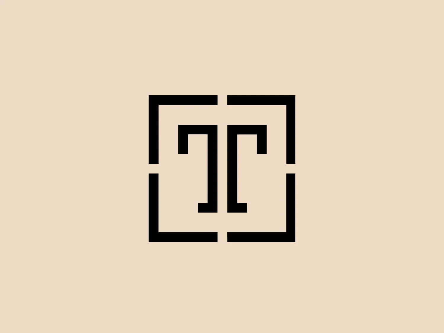 The Tomi Tothpal logo is a minimalist and symmetrical design, featuring a pair of stylized, interconnected capital letters cast in solid black within a square border. The use of negative space adds a sophisticated and modern touch.