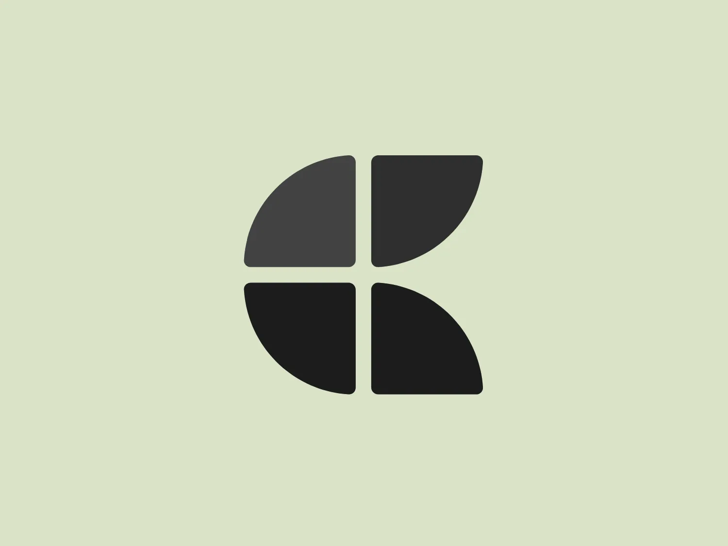 The Craft logo in the image consists of a stylized, abstract shape resembling a four-part leaf or perhaps a pinwheel. It features four distinct segments, each with its own color: magenta at the top left, bright blue at the top right, and two shades of dark navy to lighter navy filling the bottom left and bottom right sections, respectively. The segments are arrayed in a circular fashion, creating a dynamic and balanced feeling, with the interplay of the warm magenta against the cool blue hues providing visual interest. The aesthetic is modern and clean, with a flat design approach that avoids any gradients or shadows for a simple yet bold appearance.