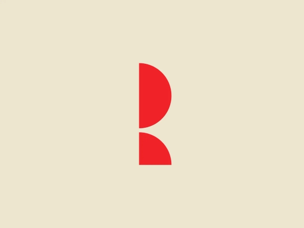 The Rosso Film logo is a bright, vivid red abstract design composed of two distinct shapes resembling the character 'B'. The upper half is a solid red semicircle, while the lower half is a backward 'C' shape, creating a sense of balance and modern appeal. The color has a matte finish that suggests energy and boldness. The simplicity of the design allows for versatile usage across various media. Given the vibrancy of the red, a neutral and subtle background color would complement it well.