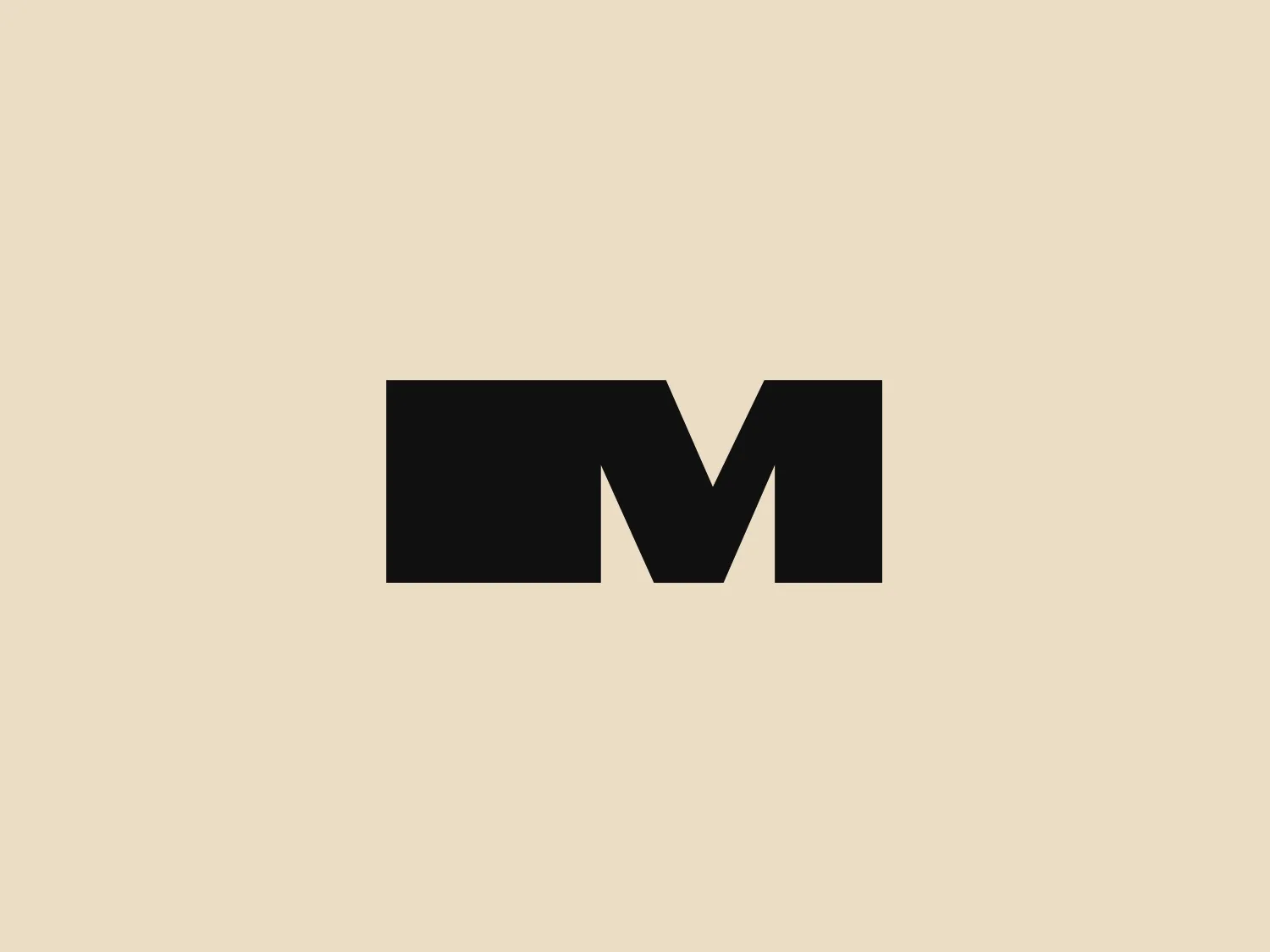 The logo for the Museum of Housing Estates features a bold, geometric "M" design in solid black. The modern and minimalist aesthetic is achieved through straight lines and sharp angles, creating a symmetrical and memorable visual effect.