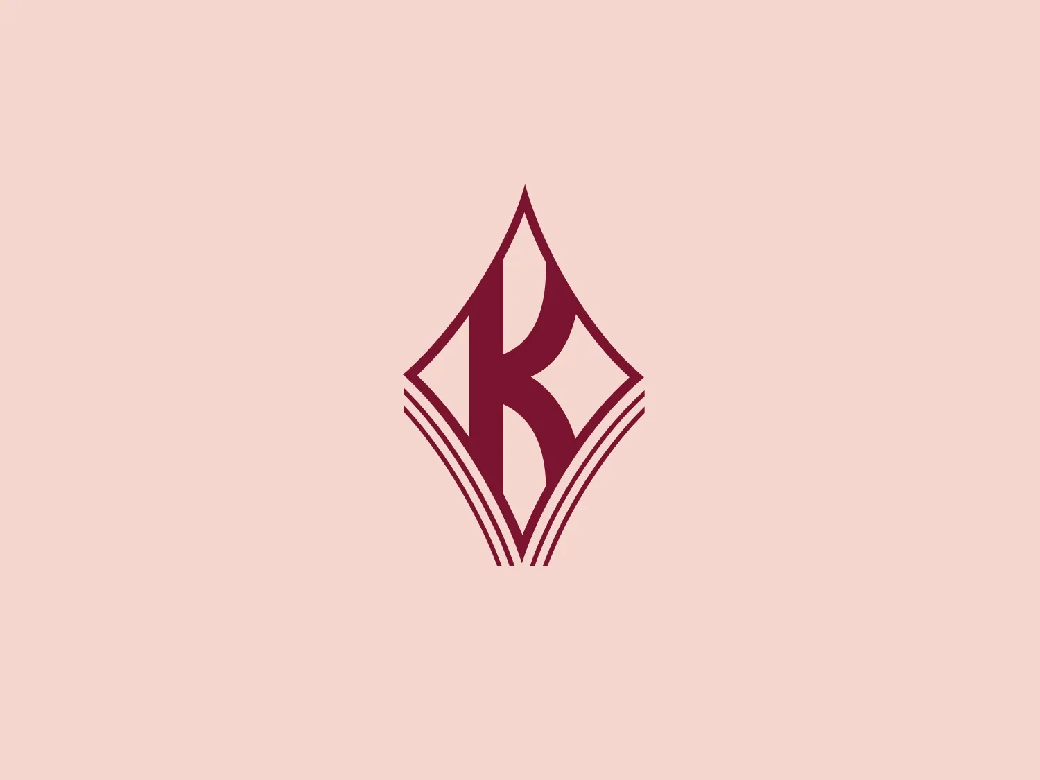 The JJ Keller & Associates logo features a stylized letter "B" in a rich, dark pink or maroon color (#7B113A). The design is encapsulated within a diamond-like shape that abstractly resembles the pages of an open book, symbolizing possibly a literary or academic theme. The "B" has thick lines with subtle serifs and contains sharp angles and straight lines, giving it a modern yet classical feel. The white space around the edges of the "B" creates a dynamic contrast that accentuates the form of the letter and the overall geometry of the logo. The logo seems simple, yet sophisticated. Hexcode: #F7DED6