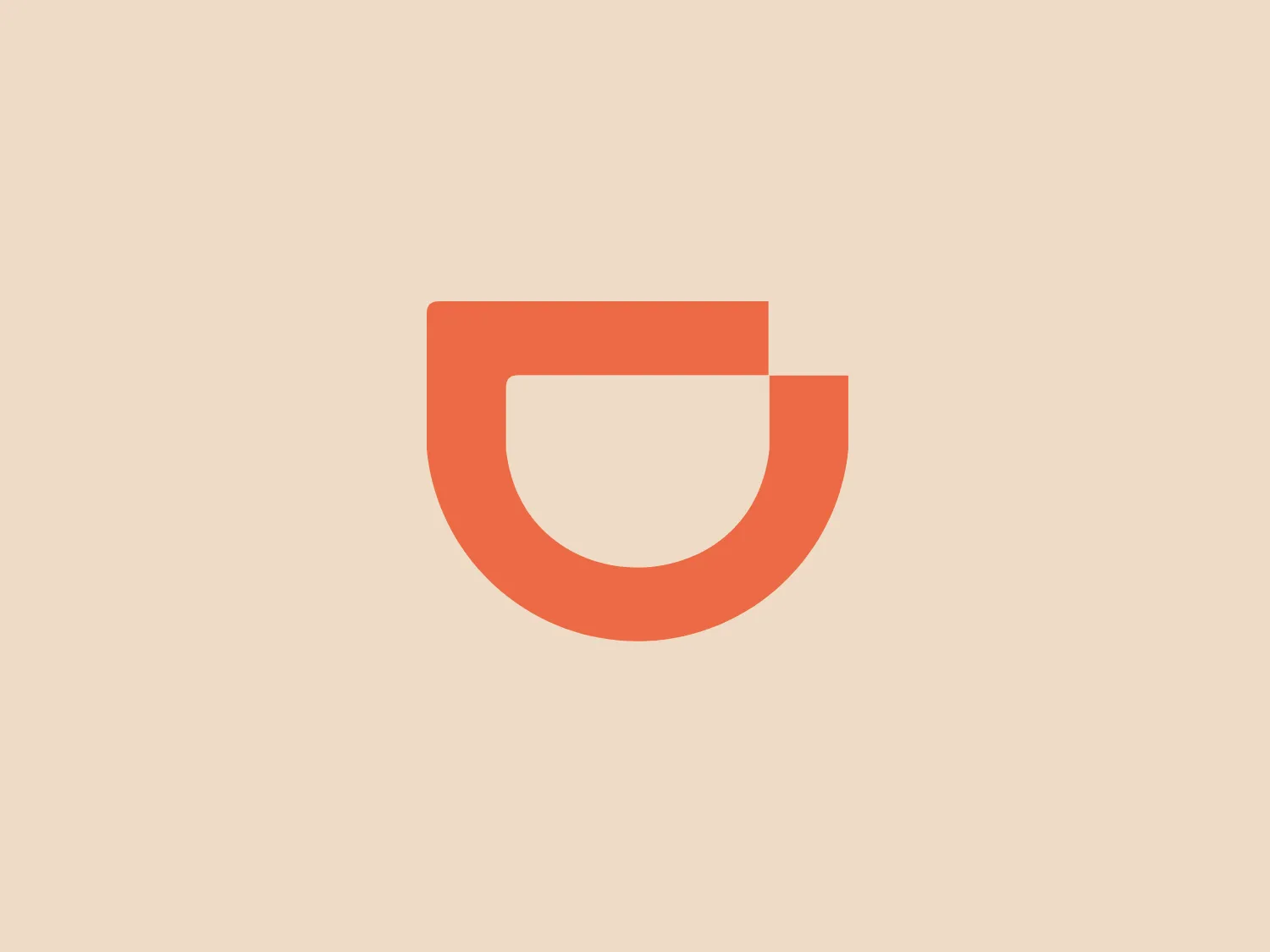 The DiDi logo features a simplistic and modern design with a stylized, geometric shape resembling a cup or a shield. It is composed of two distinct parts: a larger semi-circular shape at the top with a flat base coupled with a smaller semicircular notch taken out from the base, creating a sense of three-dimensionality and depth. The monochromatic, warm, pastel orange tone evokes a sense of friendliness and accessibility. The absence of additional embellishments or text contributes to the logo's minimalist aesthetic, making it versatile for various applications.