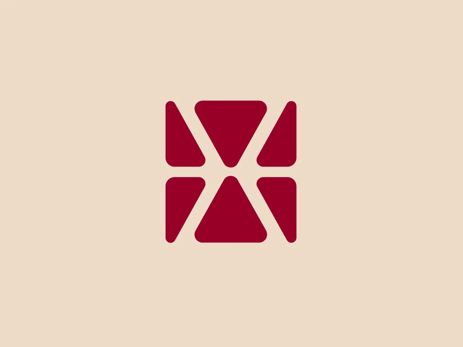 The image depicts a symmetrical logo composed of geometric shapes, representing the business name XenoTech. The central figure resembles an 'X' with truncated arms, creating a visual effect of four arrowheads pointing inward towards the center from the cardinal directions. The logo uses a solid, bold, maroon color (#800000) that suggests sophistication and strength. The overall design aesthetic is modern and minimalist, with a sense of dynamism and convergence. Considering the logo's color and style, a background that provides subtle contrast while maintaining an elegant feel would be ideal.