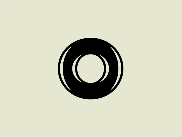 The Macquarie Group logo features a concentric circle design with a bold outer ring that encapsulates two thinner, crescent-shaped forms mirroring each other, thereby creating a central circular void. The aesthetic is minimalist and modern, using a stark black and white color scheme that suggests a sense of balance and precision. The use of negative space within the design not only centers the eye but also adds depth and a sense of sophistication to the emblem.