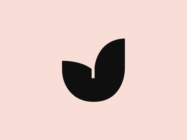 The symmetrical, abstract shape of the Jacu logo creates an elegant and versatile visual symbol with a sophisticated aesthetic.