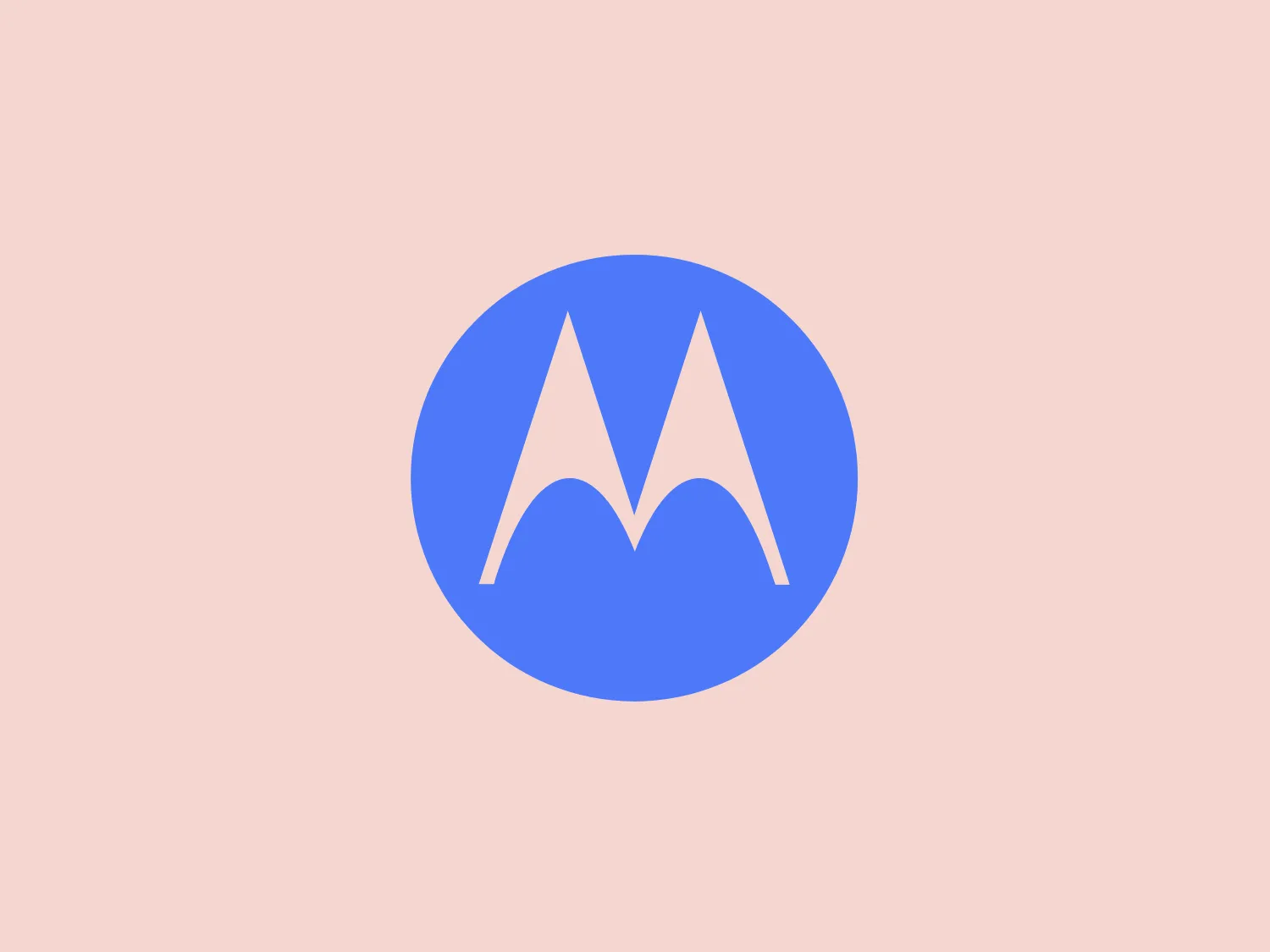 The Motorola logo features a stylized letter 'M' in bright white, set against a circular vibrant blue backdrop. The 'M' has a modern geometric design with pointed vertices at the top and a wave-like link between the two legs of the letter at the bottom, resembling mountain peaks. The contrast and simplicity of the design give it a clean, crisp, and easily recognizable aesthetic. A light, neutral shade such as pale pinkish-tan is a suitable background color that complements its vibrant tone while ensuring the white 'M' stands out.