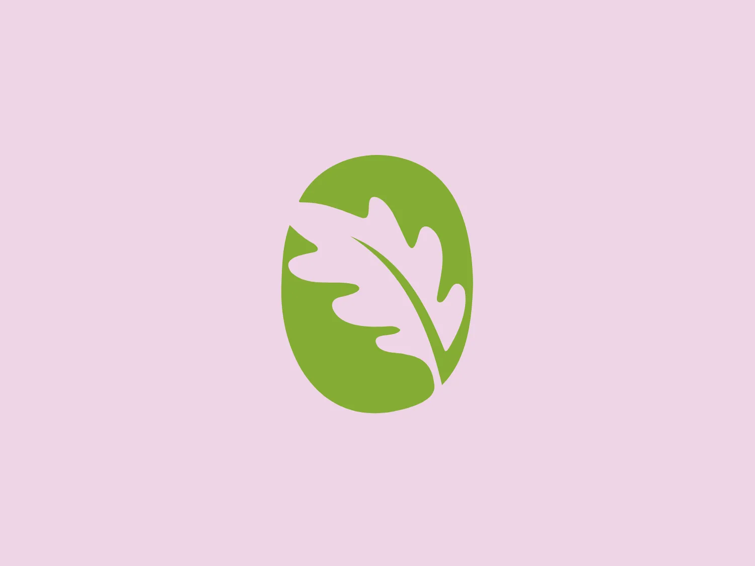 The Oak Glen logo features a simple and organic design aesthetic of a white leaf silhouette positioned against a circular, lime green background. The leaf has a smooth, flowing outline suggesting natural movement and growth, with the negative space within the leaf’s design adding visual interest. The round shape of the logo conveys a sense of wholeness and completion. The colors used are fresh and symbolize nature, health, and sustainability.