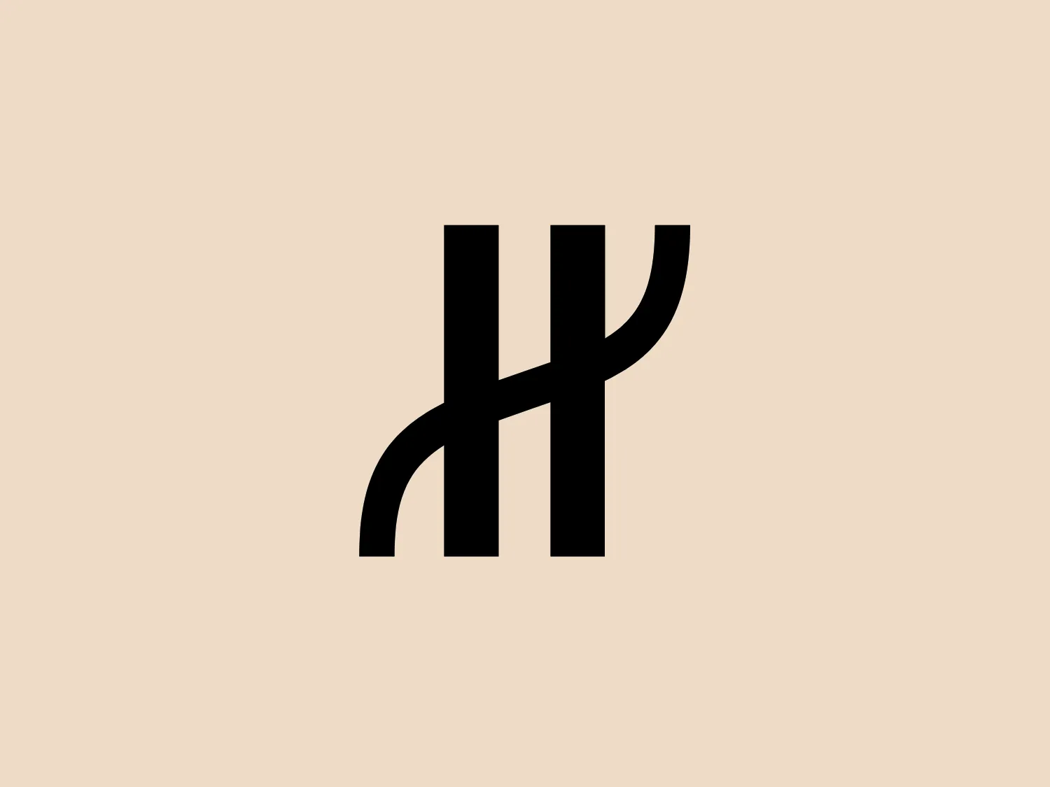 The Hublot logo is constructed of bold, black lines with a distinctly modern and minimalist design. It consists of two joined vertical bars that extend into a single horizontal curve toward the right, creating a stylized monogram or abstract representation of letters. This simple yet impactful visual forms an easily recognizable mark with a professional and sleek appearance. The contrasting use of black against a potential light background would emphasize its striking geometry and symmetry.