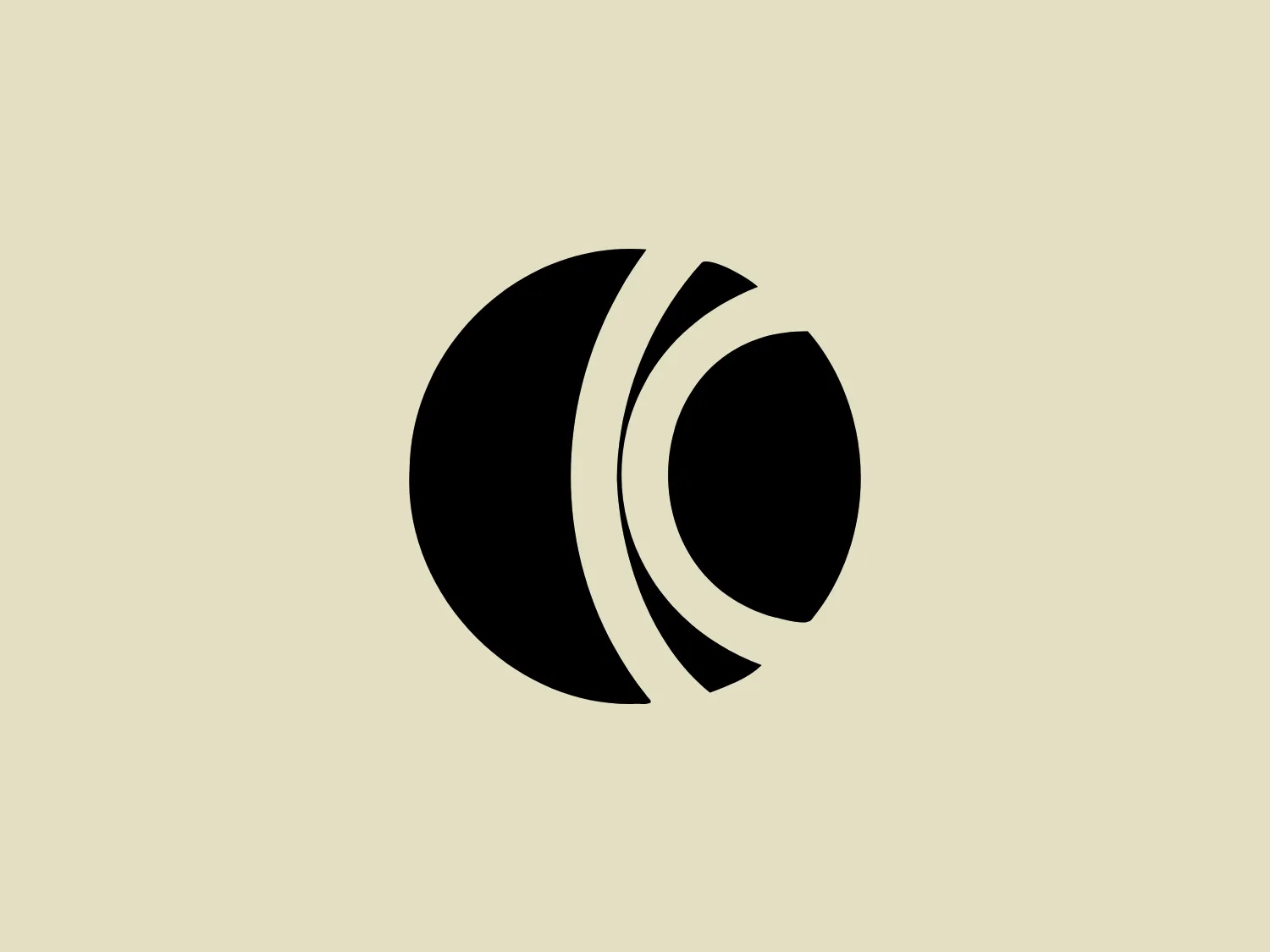 The K-tel logo is a modern, minimalist design featuring a solid black circle and a crescent-like form. The crescent shape wraps around the right side of the circle, creating a sense of motion or orbit, with two parallel curved lines extending beyond the circle's circumference. The sleek curves and black color against a white background give the logo a dynamic and contemporary appearance, making it versatile for various applications.