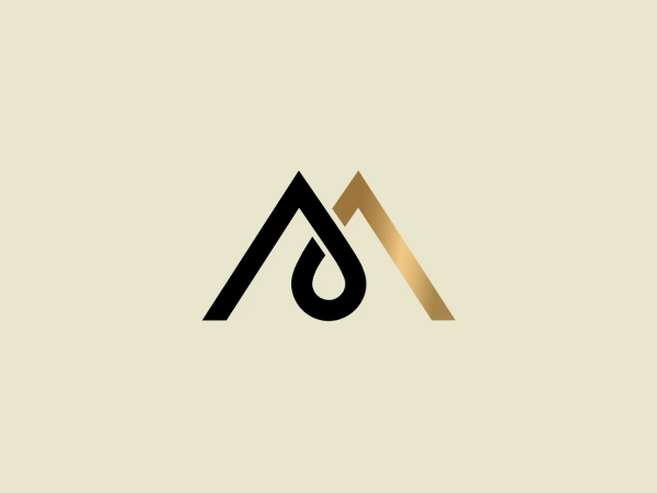 The Mountaindrop logo showcases a stylized letter "M" formed by two interconnected triangles, resembling a mountain. The right triangle slightly protrudes, adding depth to the design. Within the left triangle, a droplet shape is integrated, symbolizing elements such as water or nature. The color scheme is minimal, with black on the left and a gradient transitioning from black to metallic gold on the right, evoking a sense of luxury and refinement. The overall look is modern and sleek, indicative of an environmentally conscious or outdoor-oriented brand.