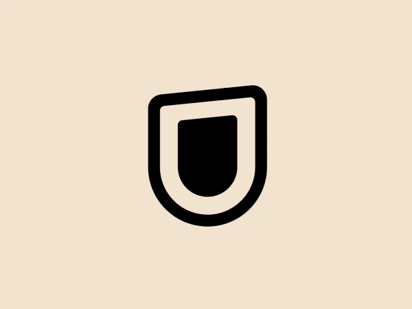 What we like is the simple and bold shield-like design of the U-Next logo, creating a strong and modern aesthetic.