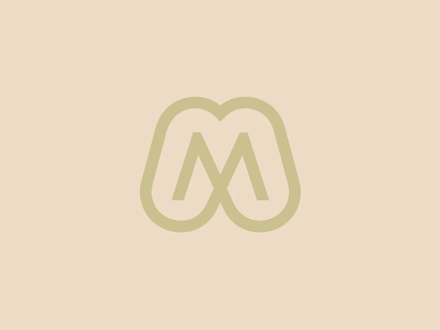 The logo for Minh Tien Coffee is a stylized letter "M" composed of two arches that join in the middle. The design is modern and sleek with soft, rounded edges, giving an overall organic and smooth feel. It is monochromatic, using a muted gold or beige tone that evokes a sense of sophistication and elegance. It’s a minimalist design, devoid of any additional embellishments, which contributes to its versatility and timeless appeal. The simplicity of the design suggests that it could belong to a brand that values elegance, clarity, and luxury.