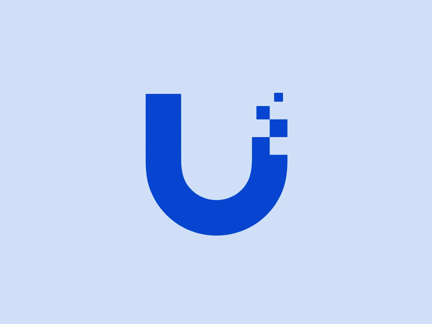 The Ubiquiti logo features a stylized blue letter that resembles a lowercase 'u' with a modification on its right side. This modification consists of two small squares, giving the impression that parts of the letter are missing or digitally altered. The color is a vibrant, solid blue, which creates a clean, modern look. The overall design aesthetic is minimalist and contemporary, with a digital or tech feel due to the pixelation effect on the right side of the 'u'.