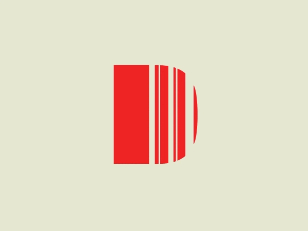 The Drum Design Awards logo is a stylized, abstract graphic made up of a set of vertical bars with various widths, creating a dynamic rhythm. The bold red color gives it a strong visual presence. The leftmost bar is the widest, representing strength or foundational stability, and the bars progressively decrease in width toward the right. This transition from solid block to slimmer stripes and the furthest right element resembling a semicircle or disk suggests movement, sound, or progression. The overall aesthetic is modern, clean, and suggests energy or technology. This design has a sense of forward motion and could be associated with digital media, sound engineering, or data visualization.