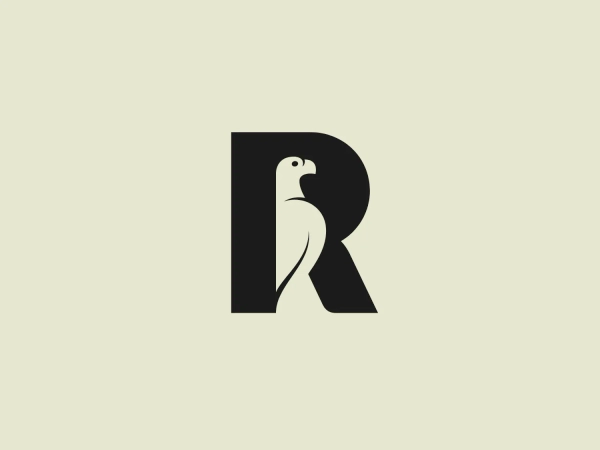 The Rhodes Trust logo showcases a bold, sans-serif capital letter 'R' with an integrated silhouette of a bird within its negative space. The bird is smoothly contoured to align with the letter's curves, adding a dynamic and thoughtful twist to the design. The logo uses a single shade of deep blue, giving it a professional and clean aesthetic.