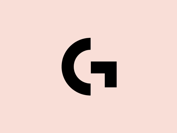 The business name "Logitech G" logo features a bold, black letter "G" with a modern and minimalist design. The "G" has a geometric quality with sharp angles and a thick line weight, giving it a sturdy and impactful visual presence. The negative space within the "G" creates a dynamic contrast that draws the eye to the center of the design. This logo carries a contemporary feel and would stand out on various mediums due to its clean and simple silhouette.