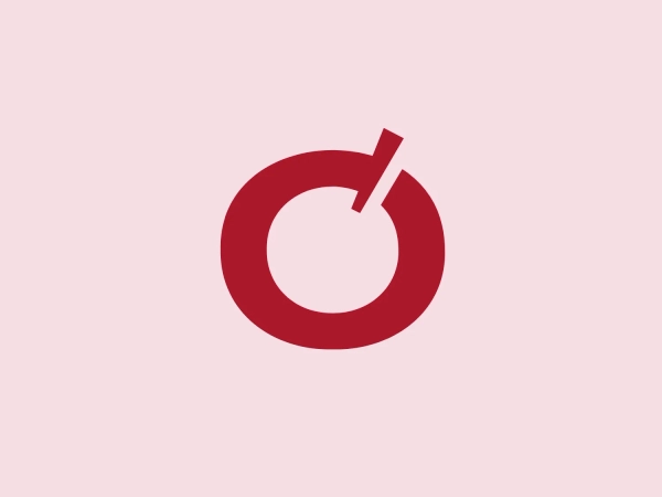 The Corazón logo features a solid maroon circle with a stylized cutout that resembles a combination of a tick mark and the silhouette of a power symbol. This creates the impression of something being turned on or checked off, indicating perhaps effectiveness or activation. The negative space created by the cutout is a key visual element, making the shape stand out. The maroon color adds a sense of sophistication and strength to the design, while the thickness of the circle and the cutout suggests stability and confidence.
