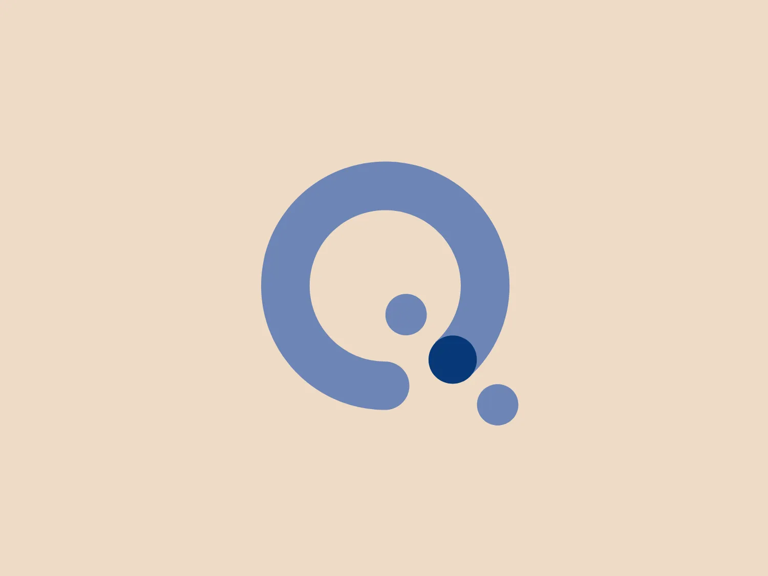 The image displays a minimalistic logo that is built around a stylized letter "Q." The logo features a large, pastel blue "Q" with its tail curving inward, ending with a flourish that includes two smaller circles in a darker shade of blue, creating a gradient effect. The overall design aesthetic is modern and clean, with a sense of fluidity and motion implied by the curving lines and descending circles. This simplicity and the cool color palette suggest a professional and contemporary brand identity for Quantum Technologies Programme.