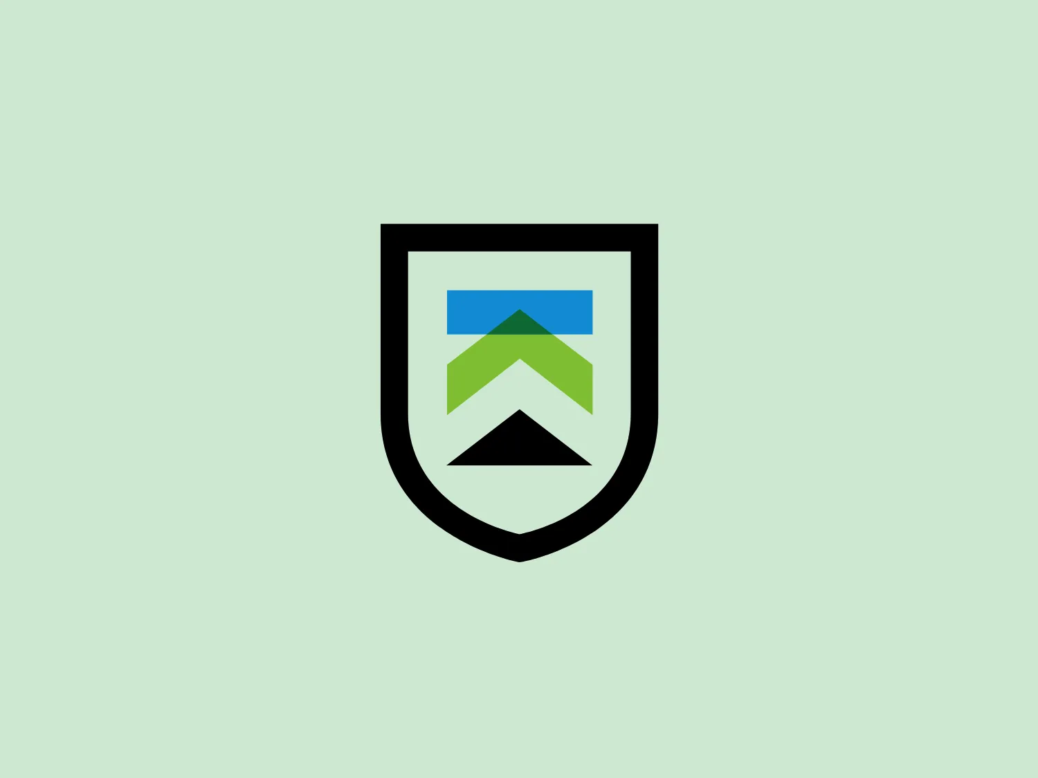 The Killington logo showcases a shield-like shape with a flat base and multiple layered geometric elements. The design includes a pronounced black outline for solidity and protection. Two upwards-pointing chevron shapes in bright sky blue and vivid green symbolize growth and progress. A rectangular block in a lighter blue adds to the modern and minimalist style, conveying stability, forward movement, and an environmental or outdoorsy feel.