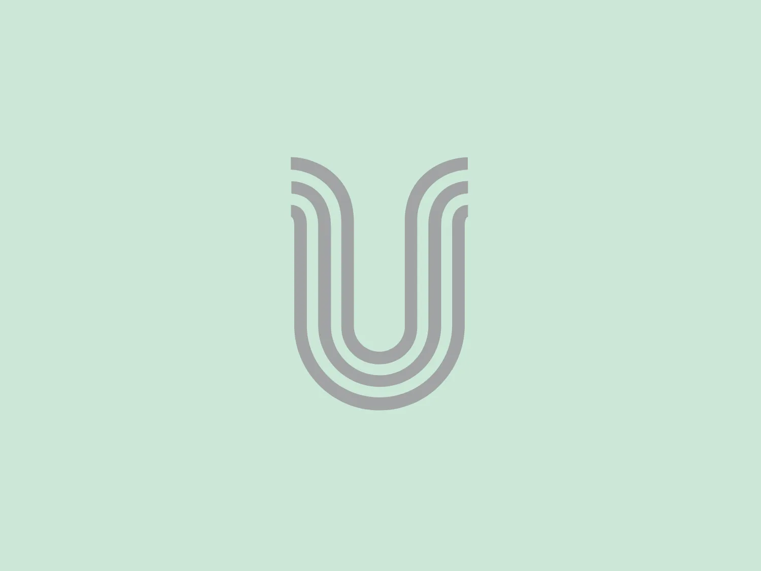 The business logo for Universal Geneve features a minimalist and modern depiction of the letter 'U' comprised of three continuous, equidistant lines tapering to form the curved shape of the letter. The monochromatic light grey color scheme emphasizes a sleek, professional aesthetic, while the simple and elegant design allows for versatile branding applications.