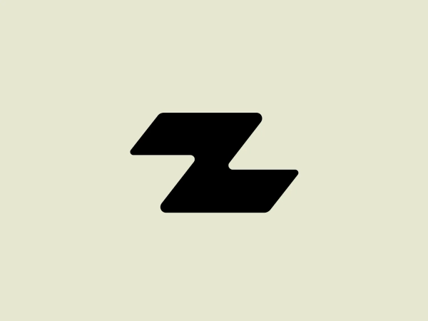 What catches our eye is the bold, dynamic tension created by the overlapping right-angled shapes in Grupo Zeta's minimalist logo design.
