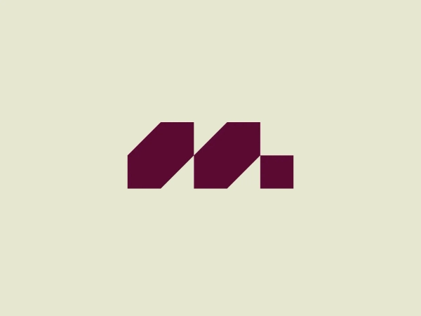 What we like: The Marberg logo's stylized geometric design creates a sense of perspective and depth, giving it a modern and sophisticated aesthetic.