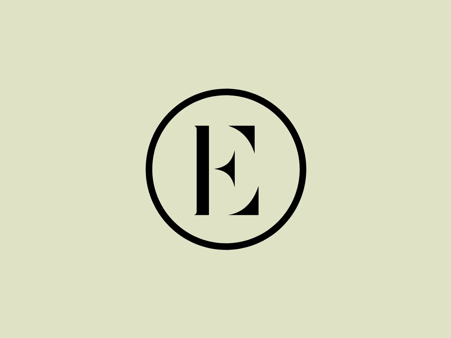 The Everygirl logo features a bold, black capital letter "E" centered within a crisp black circle. The modern, serif font style adds a touch of elegance and formality, creating a minimalist and professional aesthetic. The black-and-white color scheme exudes a classic and timeless quality, making the logo versatile across various backgrounds.