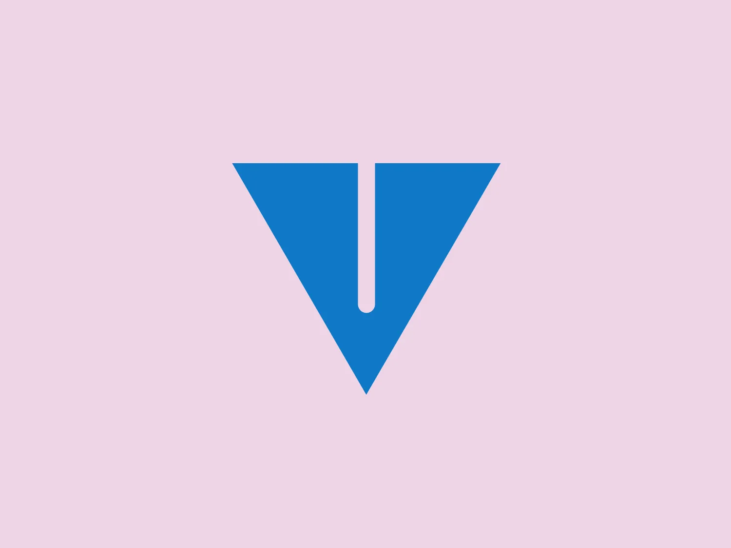 The Vanguard logo is a simple and modern design consisting of a stylized blue triangle with a white vertical line running down from the apex, dividing the shape slightly off-center. The triangle's borders are sharp, and its color is a solid, bright shade of blue. The white line creates a subtle contrast and adds a layer of visual interest, giving an impression of depth or a fold in the shape. The logo employs flat design principles, with no gradients or shadow effects, which suggests a sleek, contemporary feel. The crisp lines and use of geometric shape convey a sense of stability and professionalism.